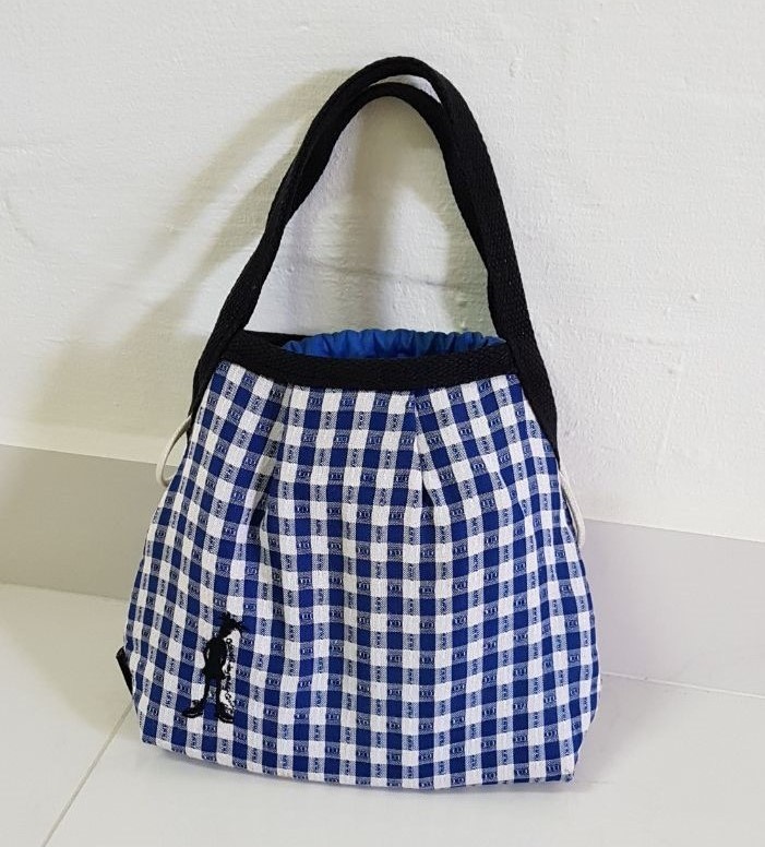 Checkered Bag<br/>Price: $30.00